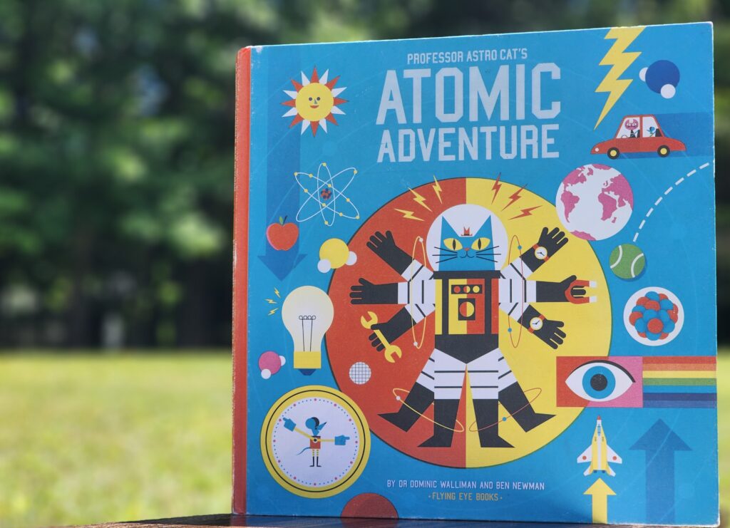 Explaining advanced physics concepts with living science books.